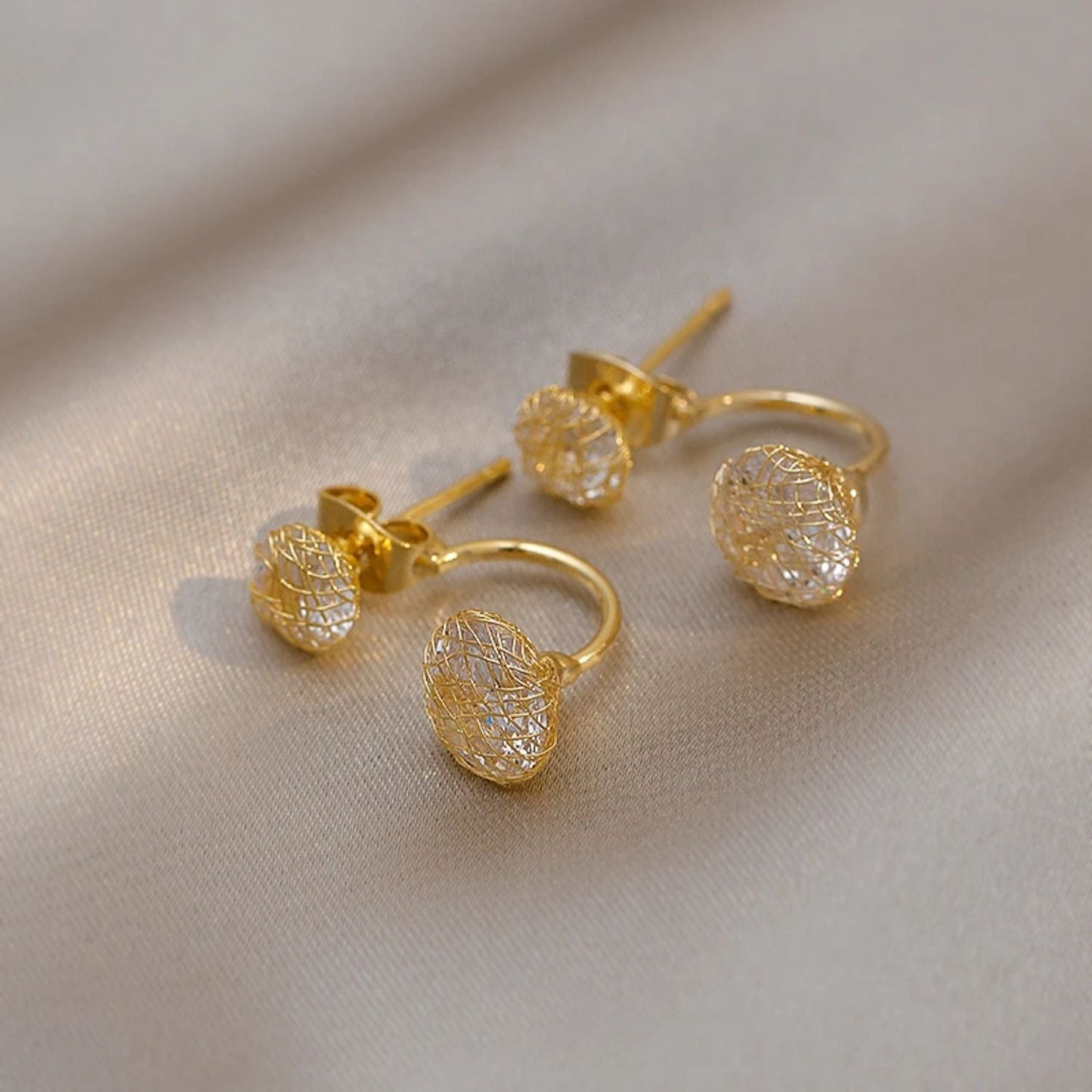 ARETES DE BOTÓN DOBLES