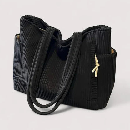 Bolso de pana con estilo práctico y moderno