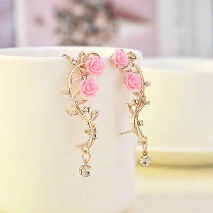 ARETES DE PUÑO ROSA