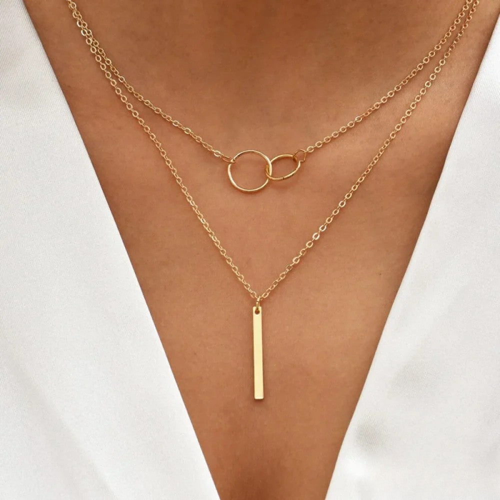 Collar retro dorado con colgante de doble círculo