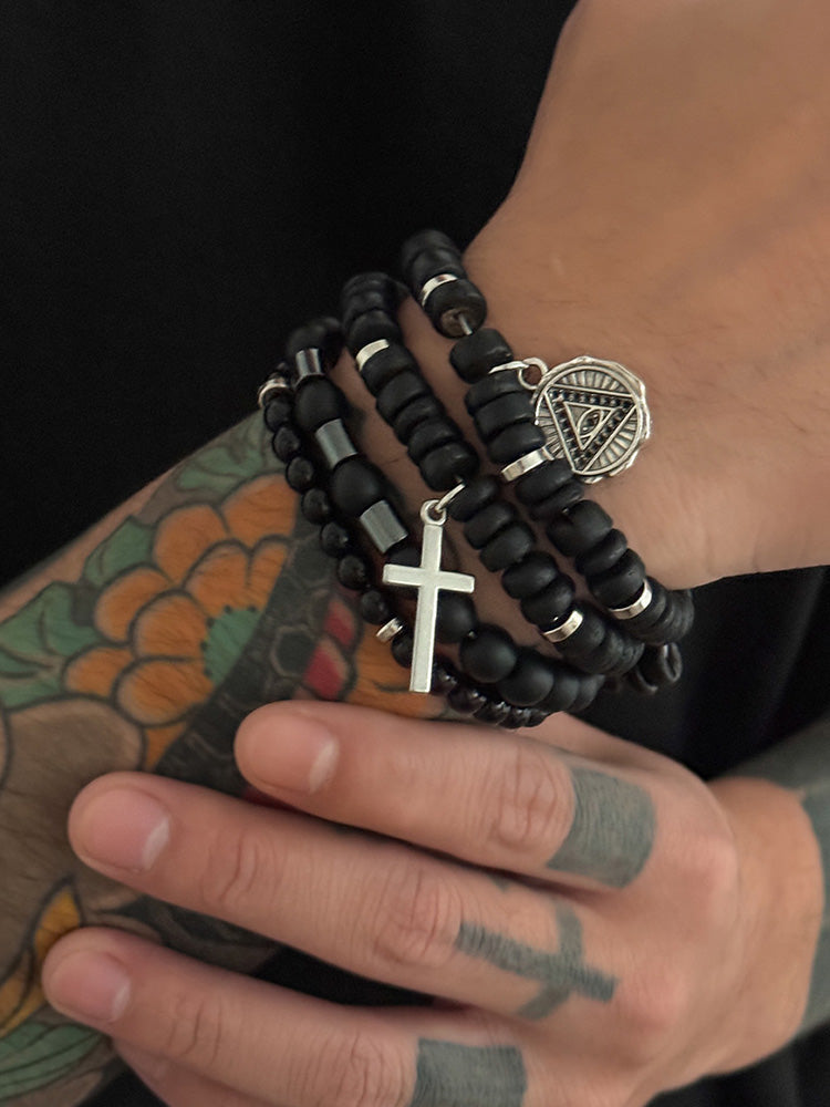 Set de 4 pulseras  de cuentas con cruz