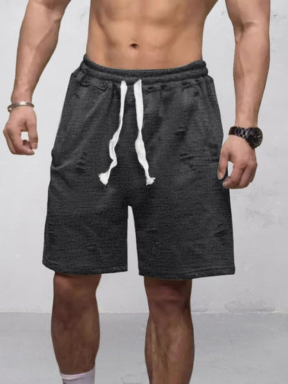 Shorts rasgados de comodidad activa