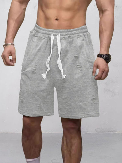 Shorts rasgados de comodidad activa