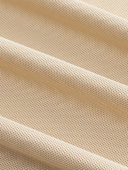 Polo de moda de corte holgado