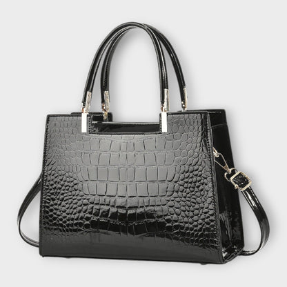 Bolso de mano con patrón de piel