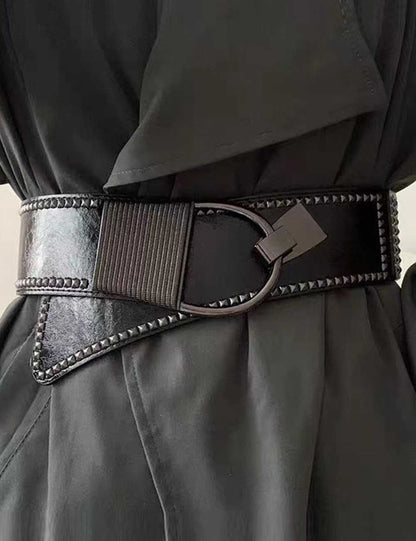 Cinturón ancho elástico con tachuelas