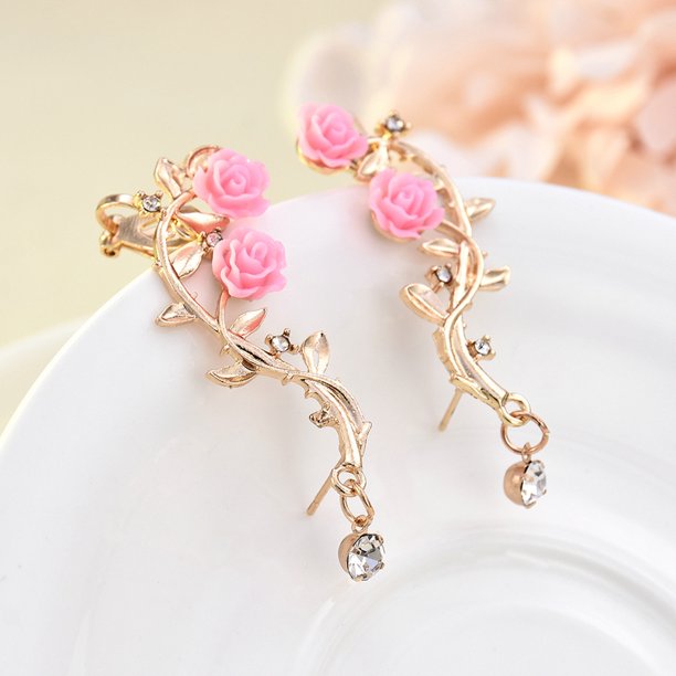 ARETES DE PUÑO ROSA