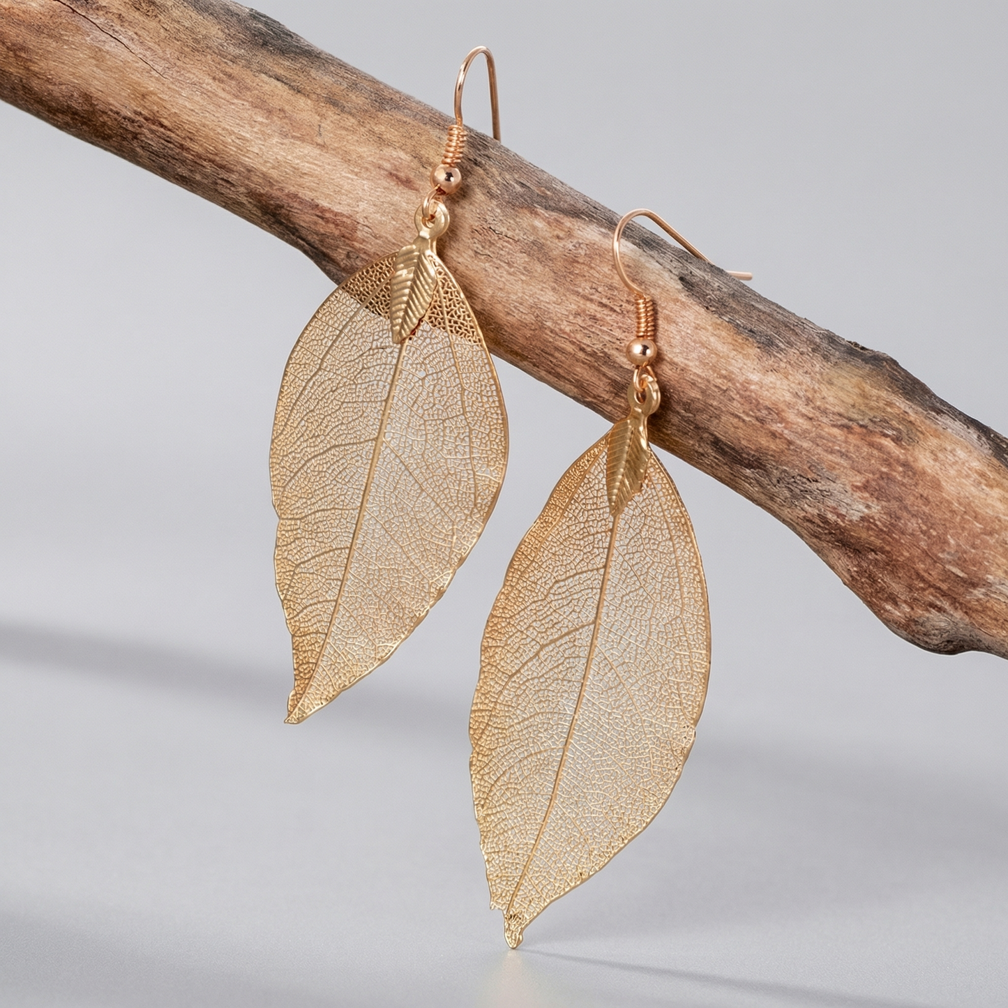 Pendientes de hoja dorada