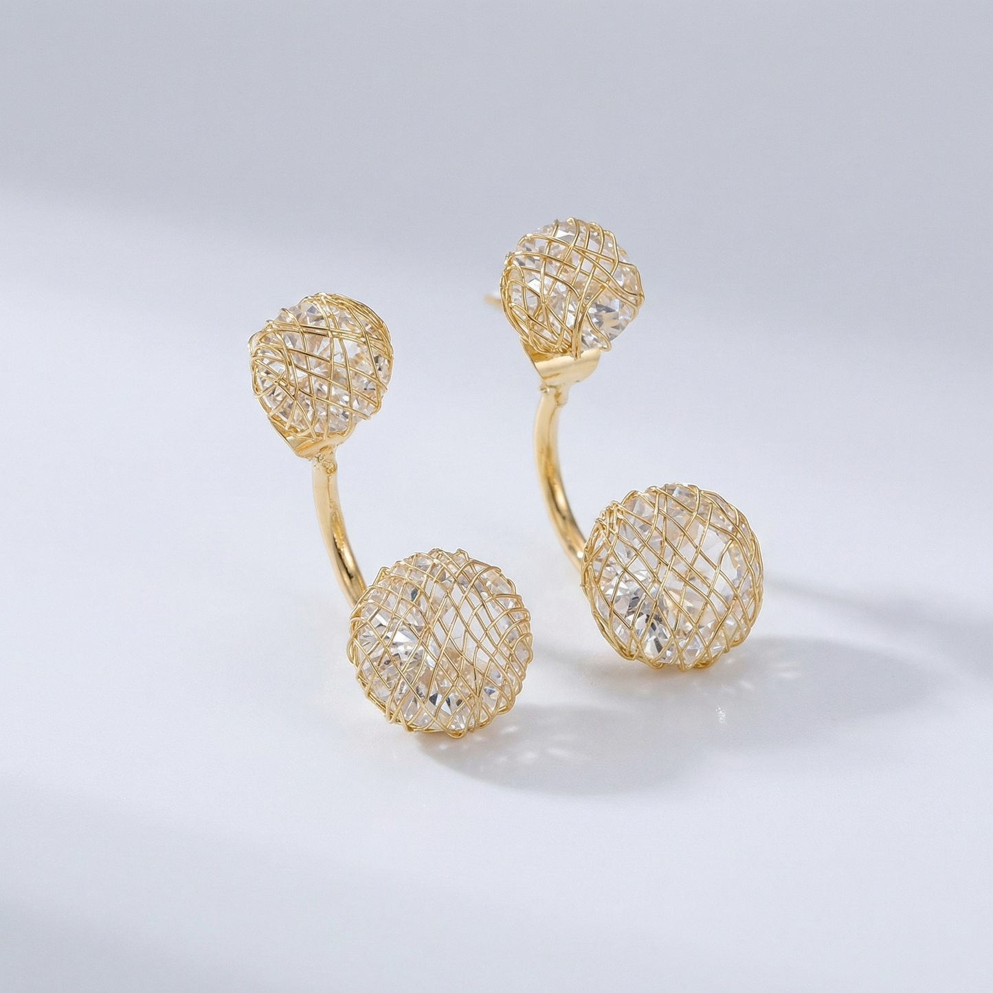 ARETES DE BOTÓN DOBLES